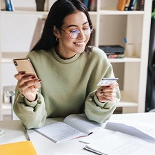 Woman holding a credit card
