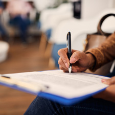 Patient filling out form in lobby