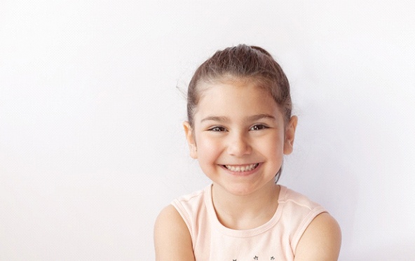 Smiling little girl, benefiting from HealthyStart® in Fuquay-Varina
