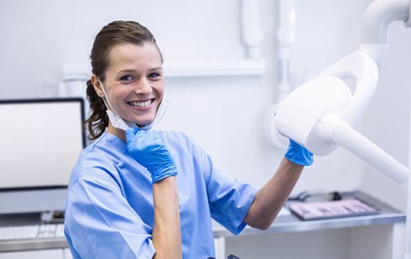 Dental hygienist smiles